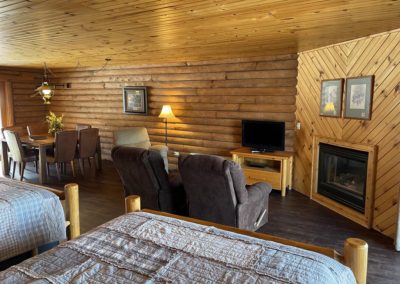 rooms with fireplace, cedar lodge, wisconsin dells lodging, wi dells cabin rentals, rustic cabins, waterfront lodging wi dells, kitchenettes, rooms with kitchens, rooms with oven, wisconsin dells resorts, rooms for rent with refrigerator