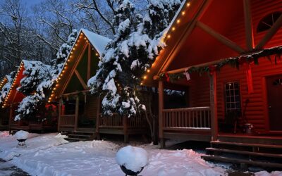 Snowy Log Cabins with decorations @ Cedar Lodge in Wisconsin Dells. TripAdvisor’s #1 Resort since 2012