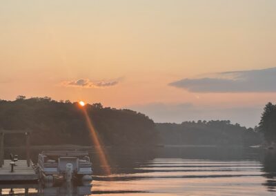 Cedar Lodge and Settlement on the WI. River. Lower dells. Top rated waterfront resort. Cabins, Villas and Suites for rent. Family Reunion, Beach, pool and boat launch.