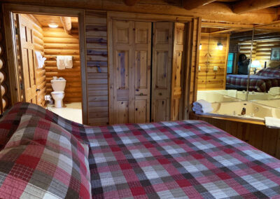 Log Cabin with loft, full kitchen, whirlpool, lodging on the lower dells WI. River at Cedar Lodge and Settlement, cabin rentals