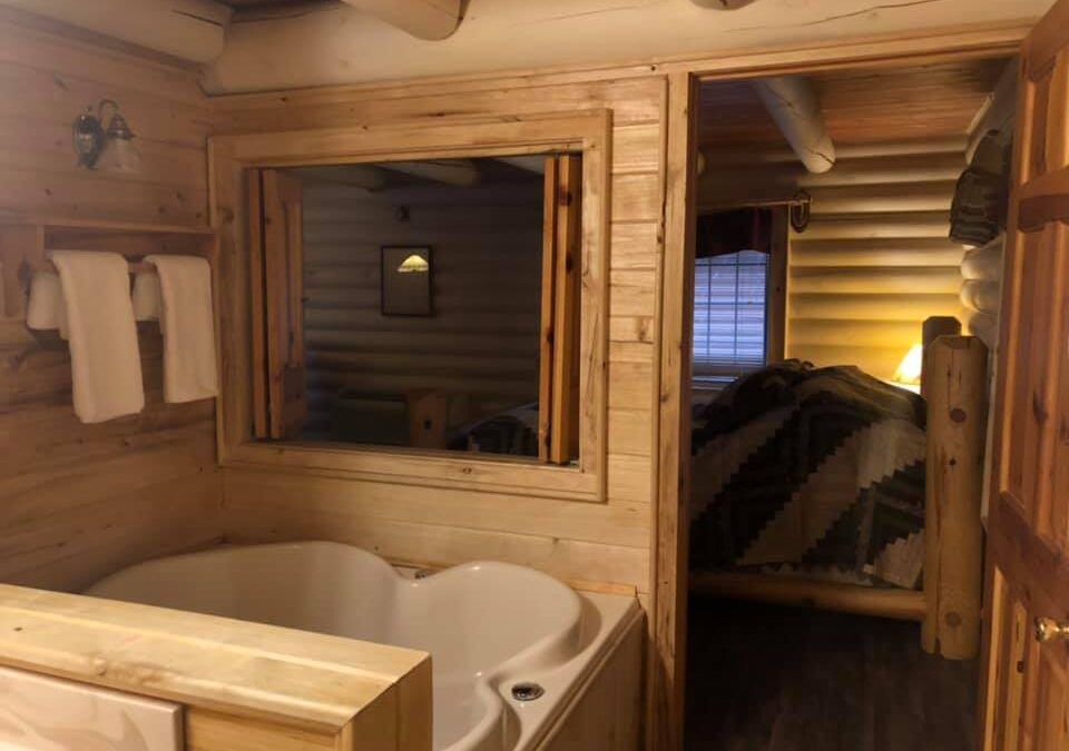 Log Cabin with loft, full kitchen, whirlpool, lodging on the lower dells WI. River at Cedar Lodge and Settlement, cabin rentals