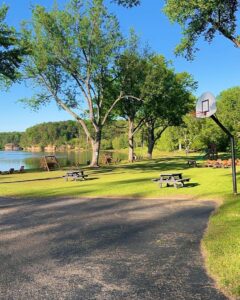 Basketball hoop, Courtyard and WI River at Cedar Lodge and Settlement in Wisconsin Dells