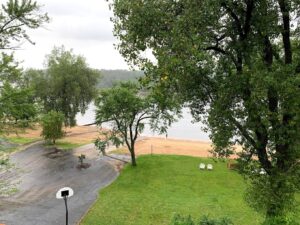 Balcony view of courtyard at Cedar Lodge and Settlement in Wis Dells