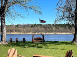 American Flag, Courtyard and WI River at Cedar Lodge and Settlement in Wisconsin Dells