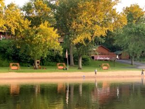 Boat view of courtyard at Cedar Lodge and Settlement in Wis Dells