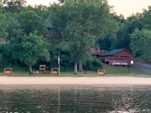 Boat view of courtyard at Cedar Lodge and Settlement in Wis Dells