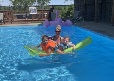 Outdoor Heated Pool at Cedar Lodge on the lower dells, WI River. Waterfront Resort. Lodging, Log Cabin rentals, Riverview Resort