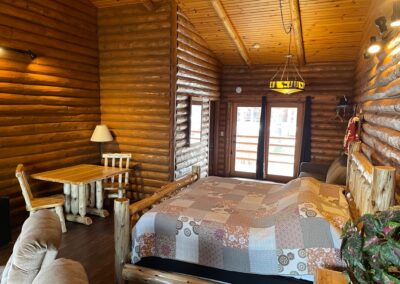 Deluxe Lodge room King Bed, lodging on the lower dells WI. River at Cedar Lodge and Settlement